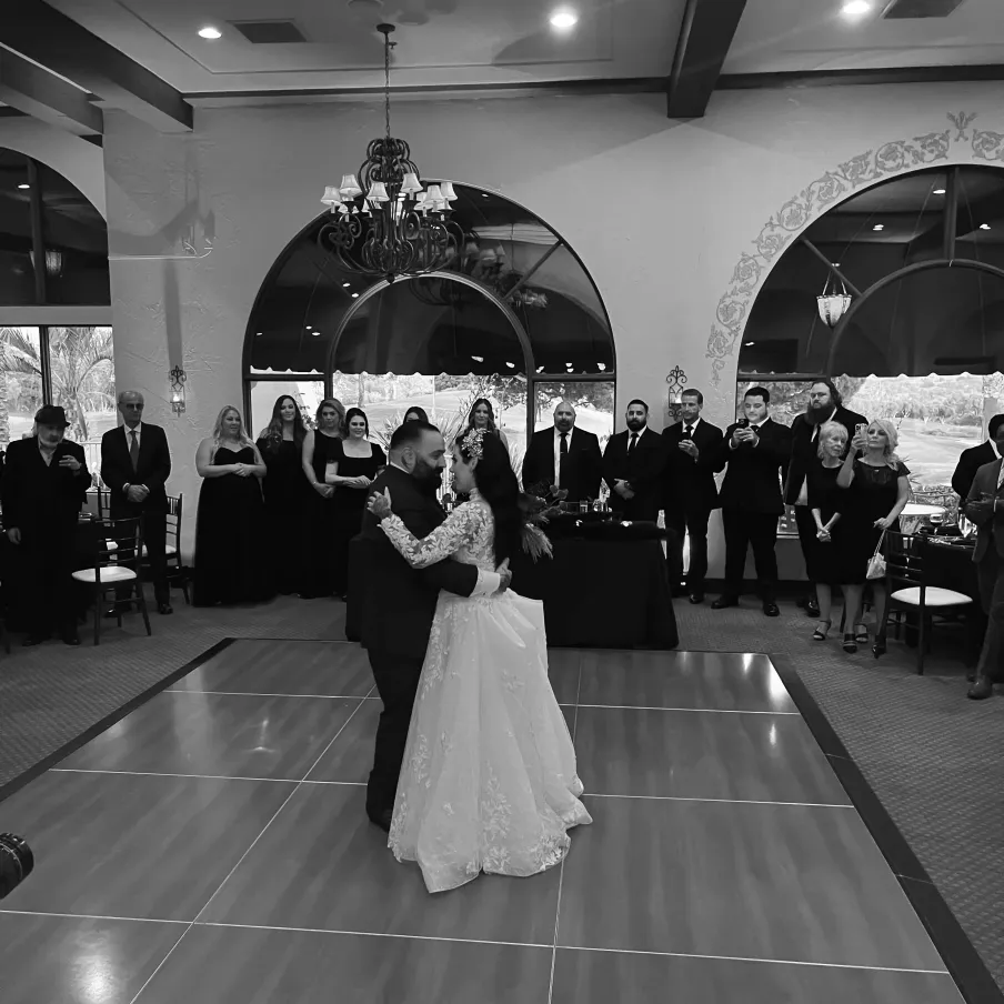 A testeemonitial and a picture of the client who wrote the testemonial during their first dance